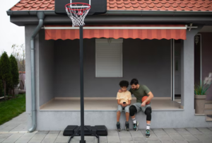 Read more about the article Why Choose a Retractable Arm Awning Over a Fixed Roof for Outdoor Shade?